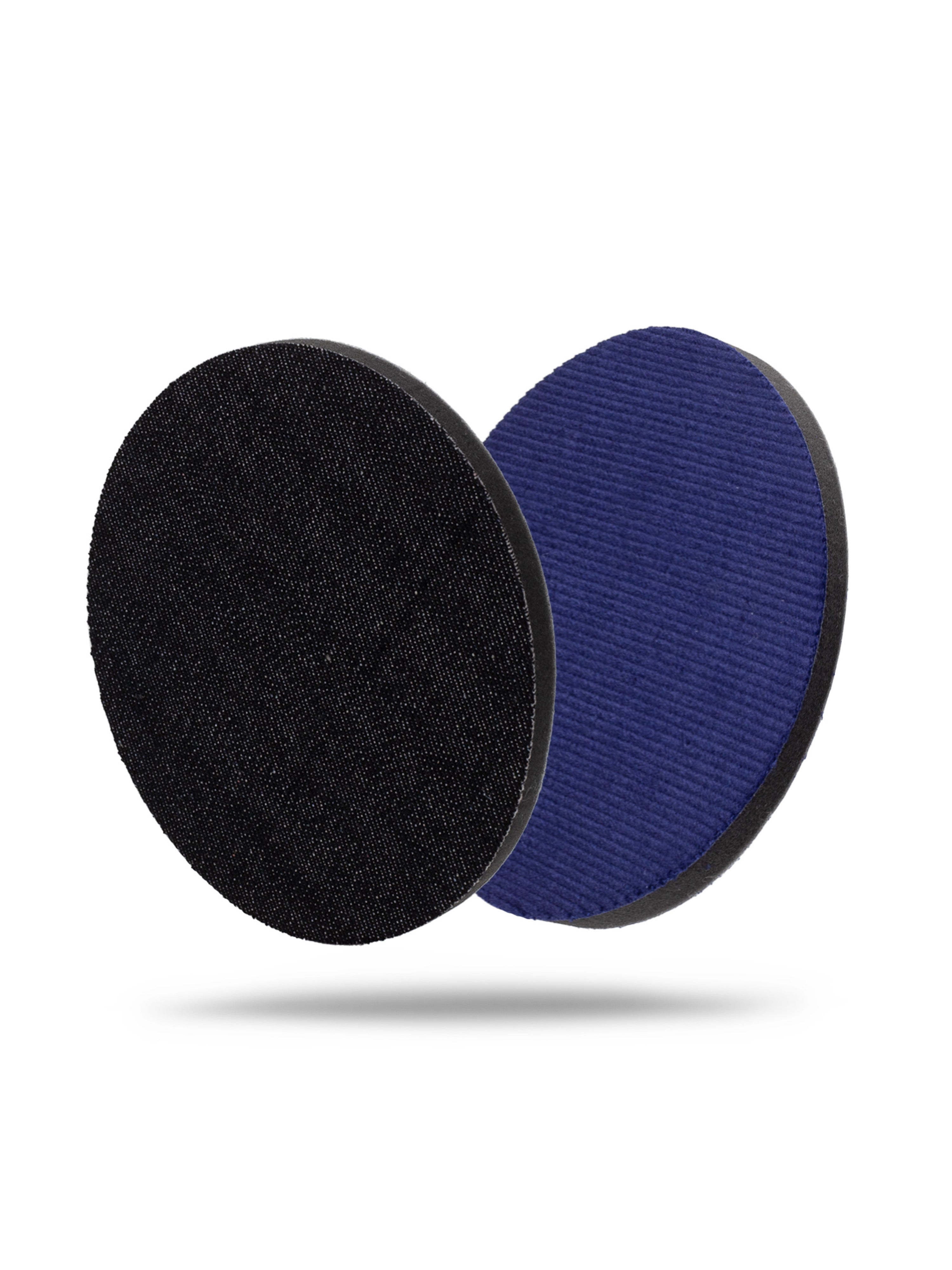 Two round textured orange peel pads floating against a white background, one in black denim and one in purple velvet, each with a black foam rim. 207Orange Peel Pads - 2000, 3000 Grit Velvet 3in, 5in (2 Pack)