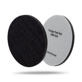 Two circular orange peel sanding discs for automotive detailing, one showing the textured black abrasive side and the other showing the light gray backing with black text reading 'Orange Peel Pad 2000 Grit'. 2071135P Orange Peel Pads - 2000 Grit Denim 5in (2 Pack)
