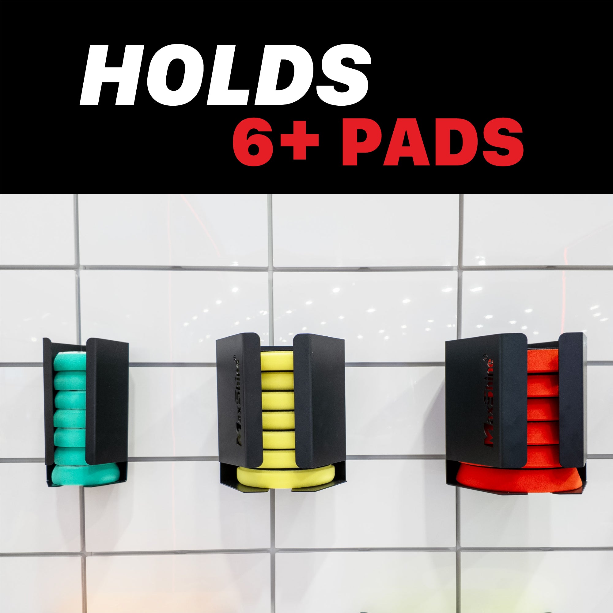 Three black wall-mounted polishing pad holders on a white tiled wall, showing green, yellow, and red foam pads inside. A black banner at the top reads 'HOLDS 6+ PADS' in white and red text. Polisher Pads Holders