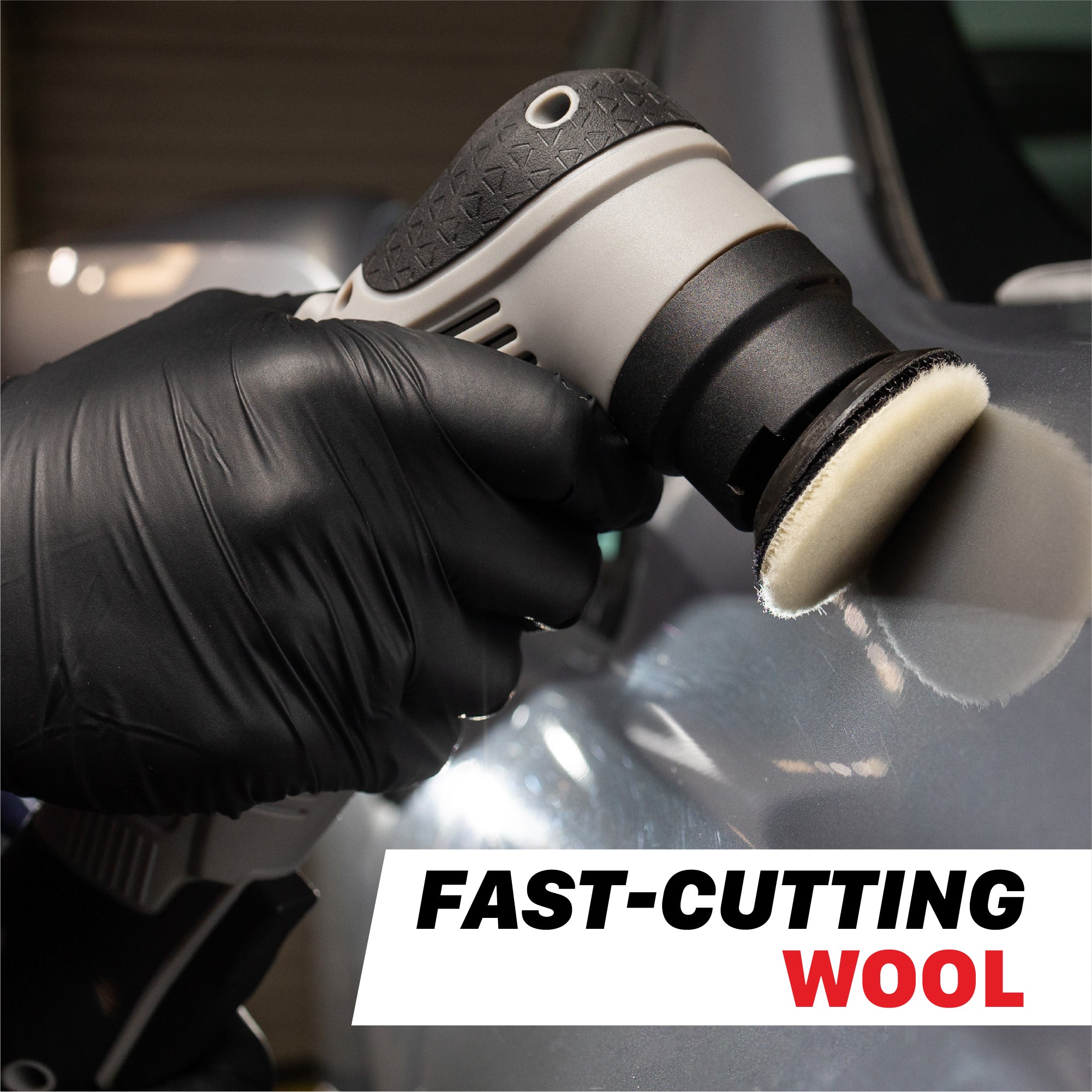 A close-up of a person wearing a black glove and holding a black and gray mini polisher with a wool cutting pad against a metallic gray car body. A text overlay at the bottom reads 'FAST-CUTTING WOOL'. M0312 V2-PK Mini Cordless Polishing Pads Kit