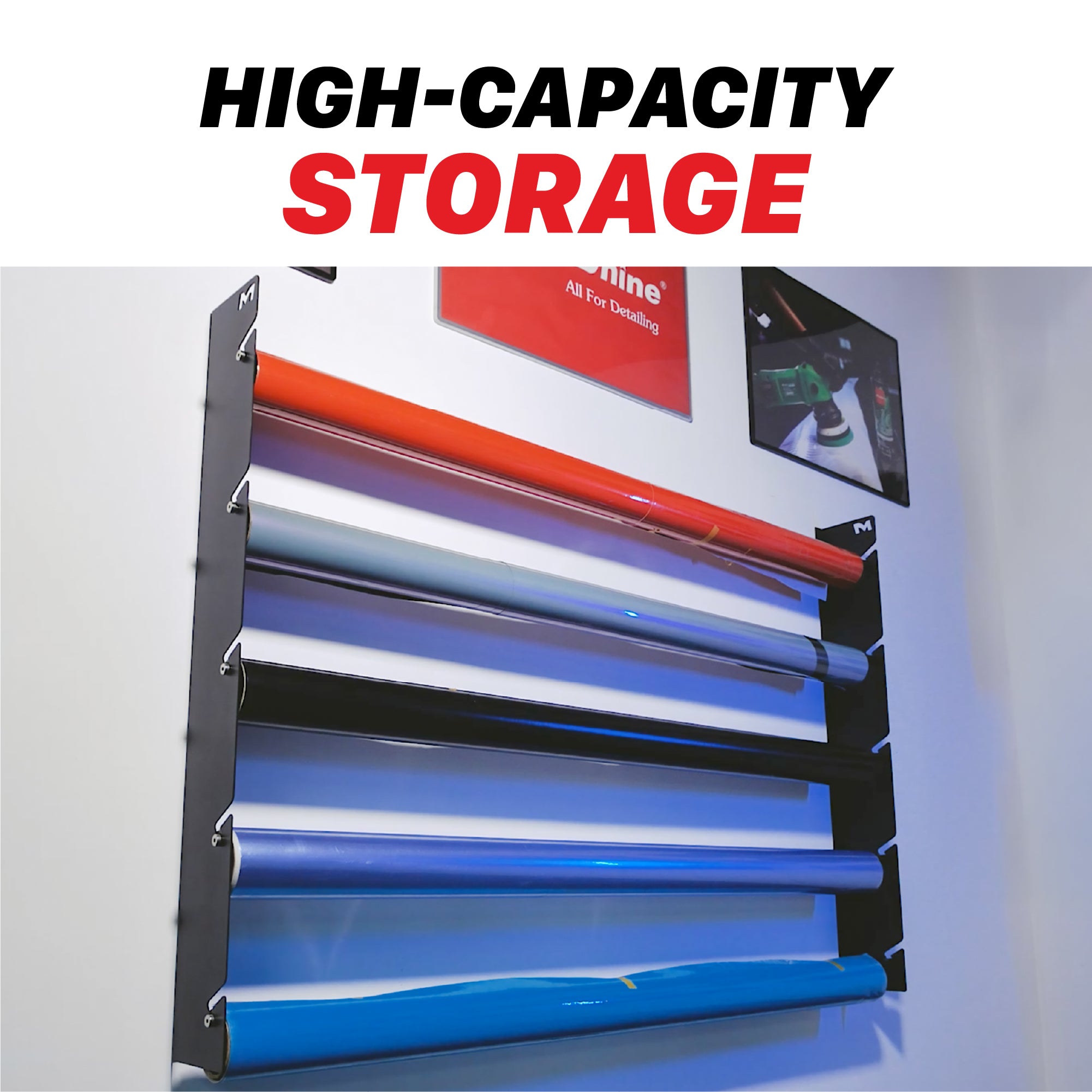 A wall-mounted high-capacity storage rack holding multiple rolls of film in different colors, with large text at the top reading 'HIGH-CAPACITY STORAGE'. The rack appears black with visible rolls in multiple colors against a light wall. H20 Wall Mounted Film Hanger - PPF and Vinyl 5 Roll Holder