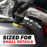 A gloved hand uses a MaxShine mini cordless polisher with a small yellow foam pad on a dark gray vehicle body. A white text banner at the bottom reads 'SIZED FOR SMALL DETAILS'. M0312 V2-PK Mini Cordless Polishing Pads Kit