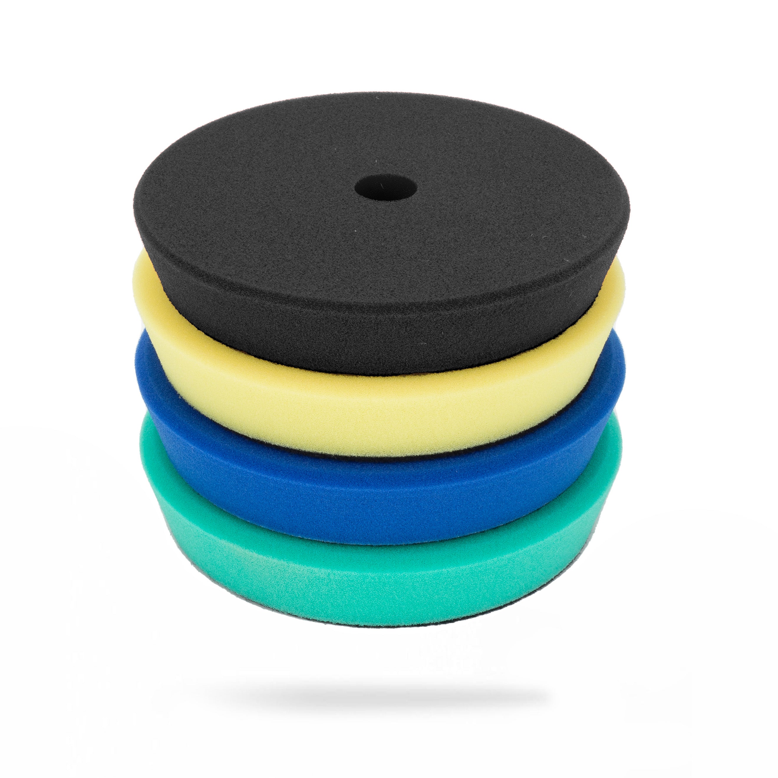 A stack of four foam polishing pads in black, yellow, blue, and green, shown on a clean white background. 202175-KIT Polisher Foam Pads | High Pro Polishing Pads Pack - 5in